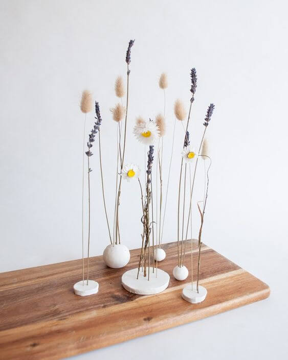 Χωρίς πολλά Χρήματα: 27 Εύκολα και Οικονομικά DIY Διακοσμητικά Σπιτιού 20 Λουλούδια σε τσιμεντένιες βάσεις